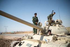 Peshmerga on a T-55 tank outside Kirkuk in Iraq (Courtesy: Wikipedia)