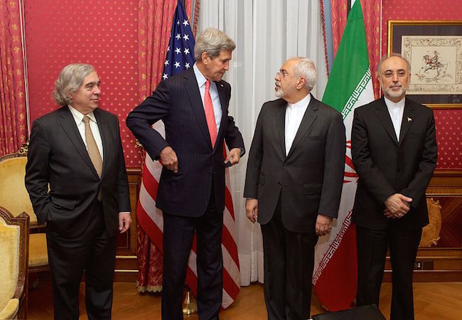 From left to right: the United States Secretary of Energy Ernest Moniz, the United States Secretary of State John Kerry, the Iranian Foreign Minister Mohammad Javad Zarif and the head of the Atomic Energy Organization of Iran Ali Akbar Salehi, in the "Salon Élysée" of the Beau-Rivage Palace (Lausanne, Switzerland) on 16 March 2015 (Photo: Courtesy of WikiCommons)